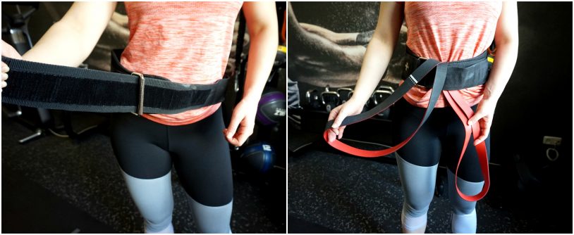 A girl in sports clothes showing the set up for the banded glute march exercise from the article "Top 8 Glute Exercises to Build and Shape your a strong Ass"