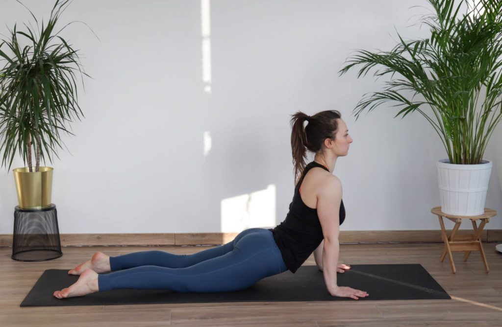 Upward facing dog yoga pose from article 8 must-do cooldown mobility exercises