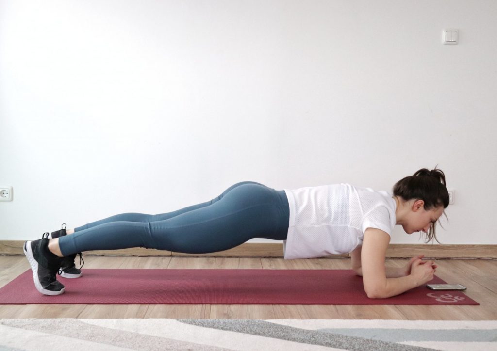 Plank exercise performed by a girl.