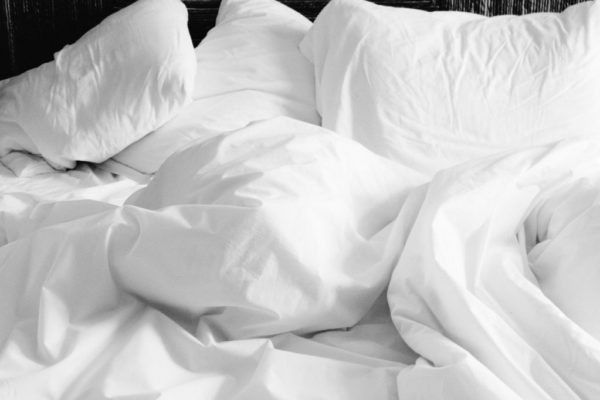 Bed and pillows for healthy sleep to help boost weight loss from article "5 sneaky habits preventing you from losing weight"