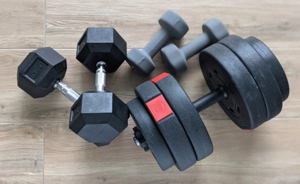 image of dumbbells on a box from the article How To Build The Best Home Gym on a Budget